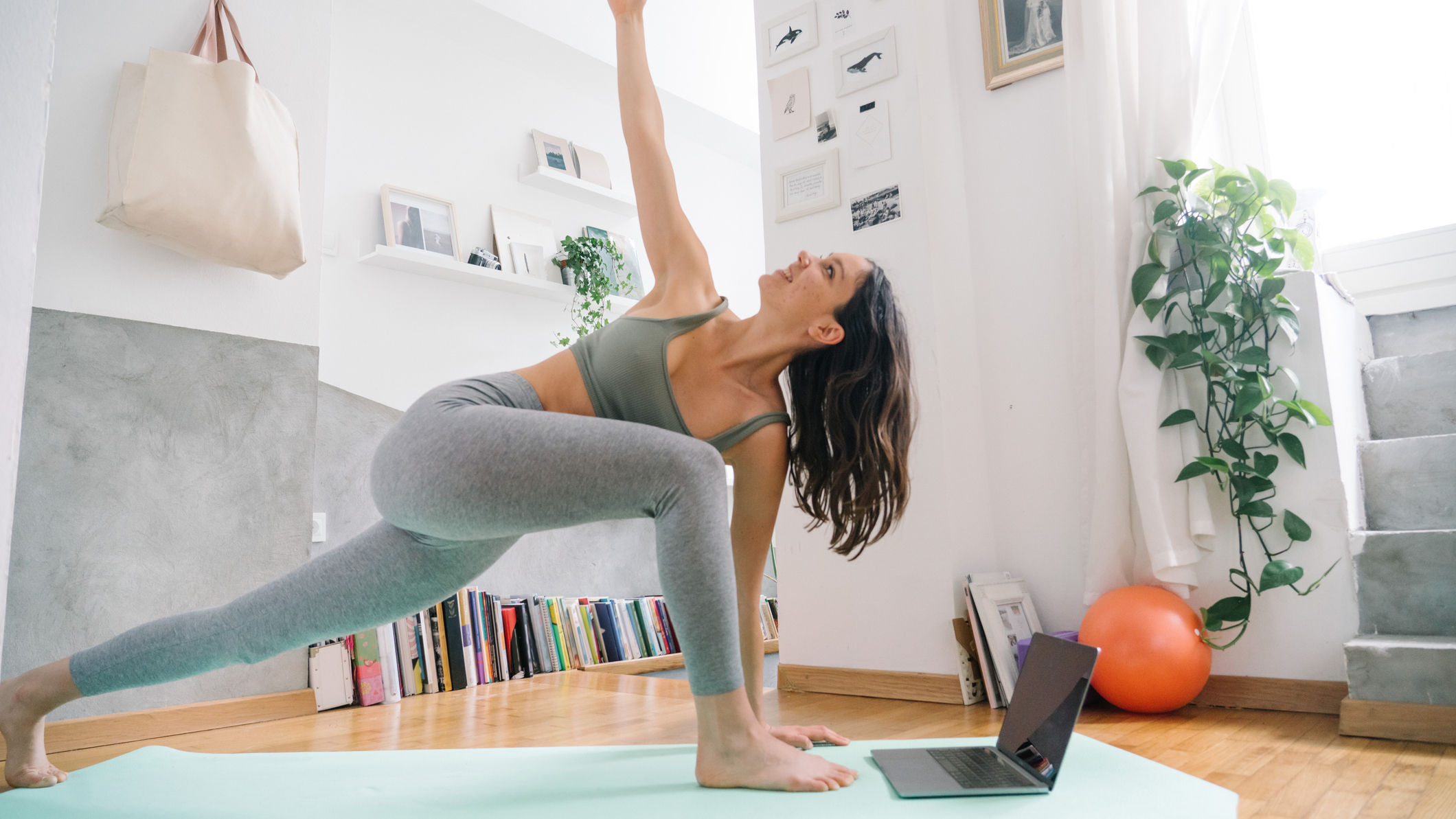 Woman stretching in domestic setting