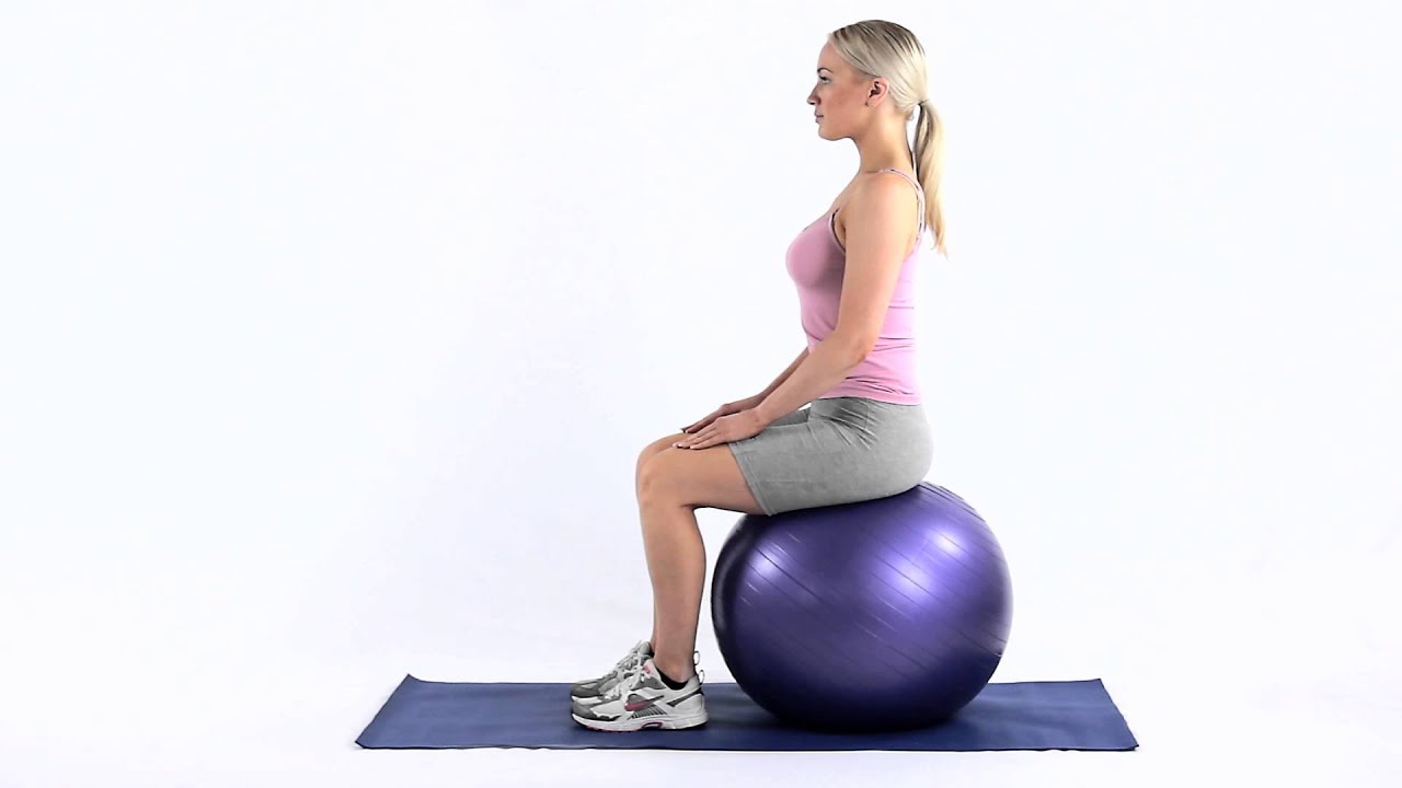 How to do a pelvic tilt sitting on a Swiss ball - YouTube