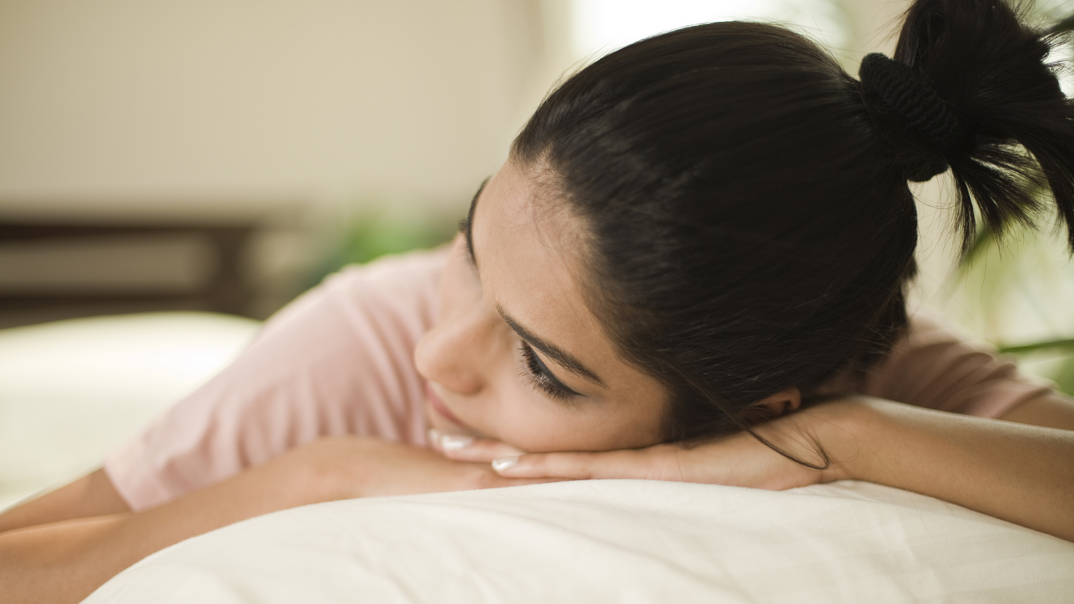 Woman lying in bed